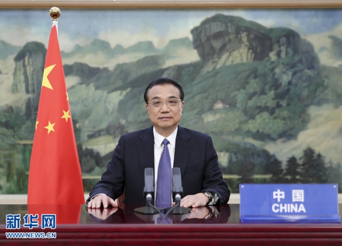6月4日晚，國務院總理李克強在全球疫苗峰會視頻會議上發表致辭。 新華社記者 丁海濤 攝